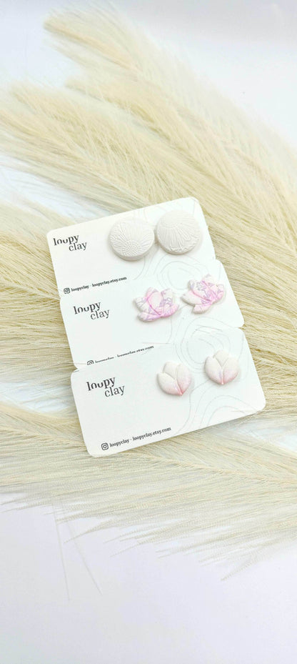 Orecchini copri lobo bianchi con margherite