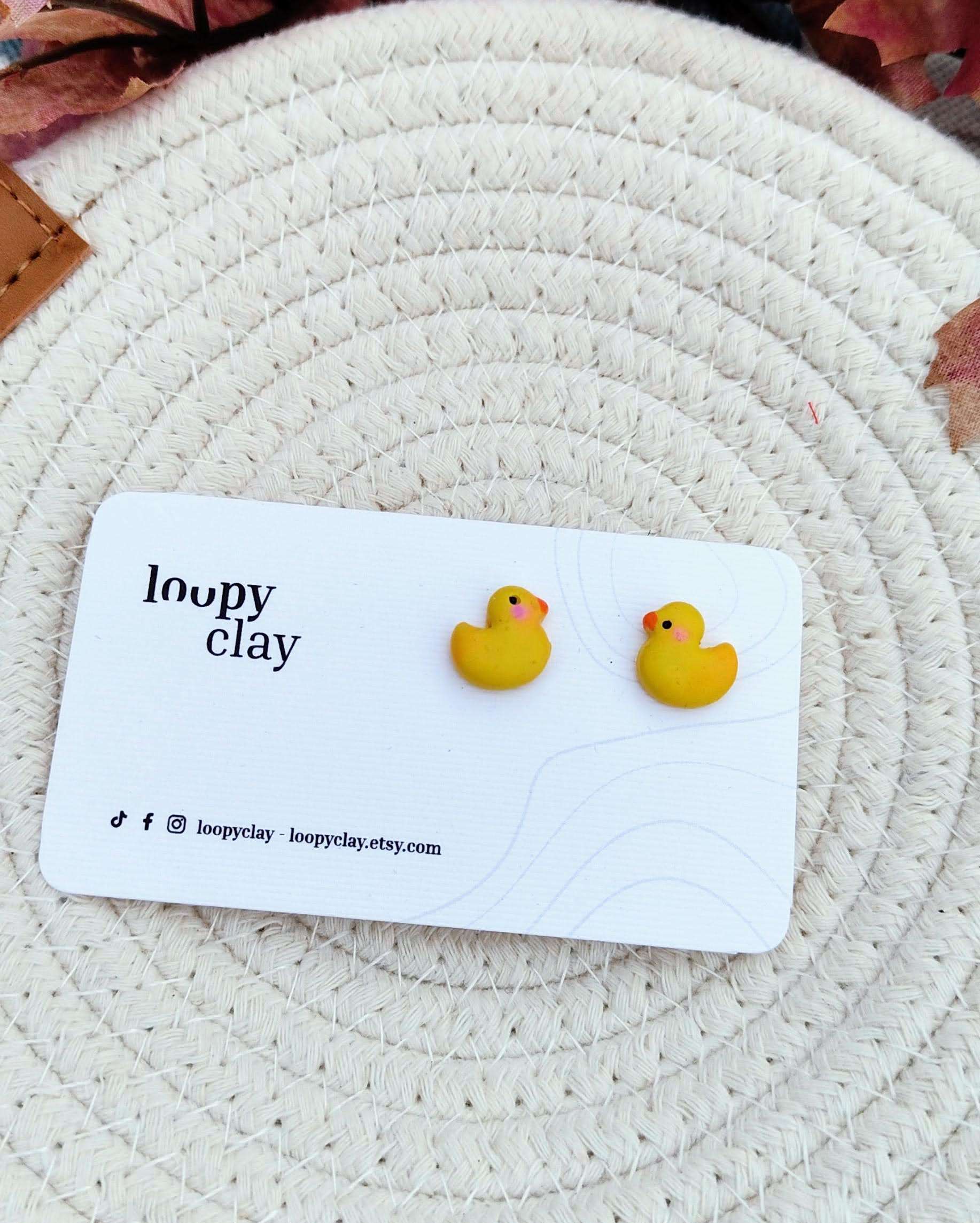 Orecchini a bottone paperella