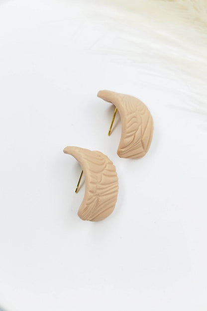 Orecchini huggies rosa tenue - geometrici e naturali