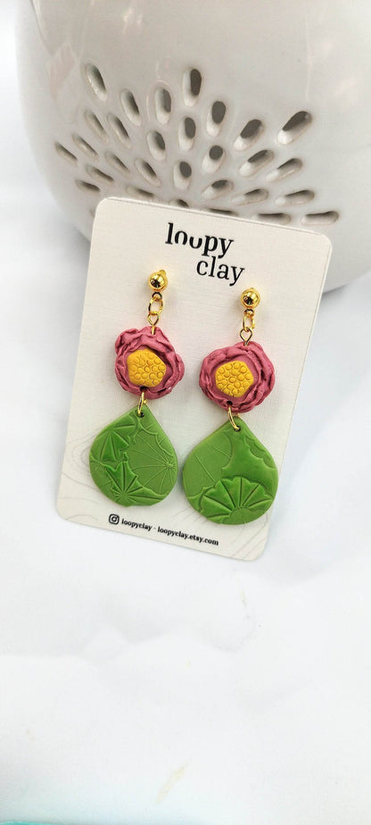 Orecchini pendenti evoluzione di fiori di loto