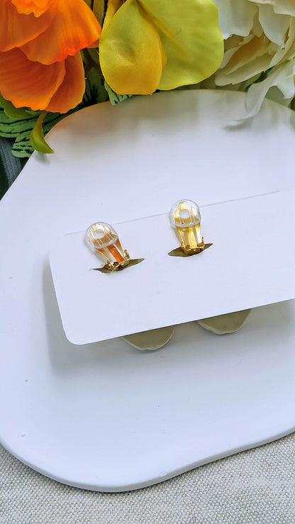 Orecchini a clip tema marino delicato