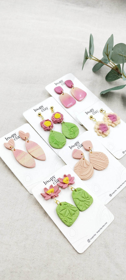 Orecchini pendenti evoluzione di fiori di loto